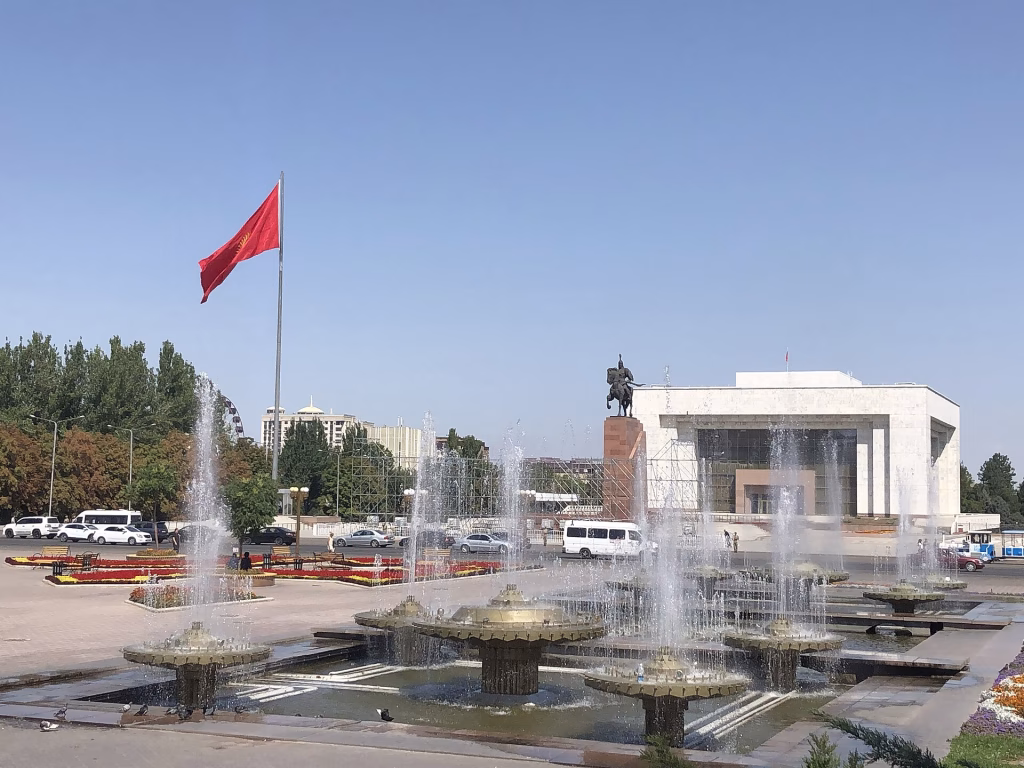 Ala-Too Square fountains and Kyrgyz flag in Bishkek